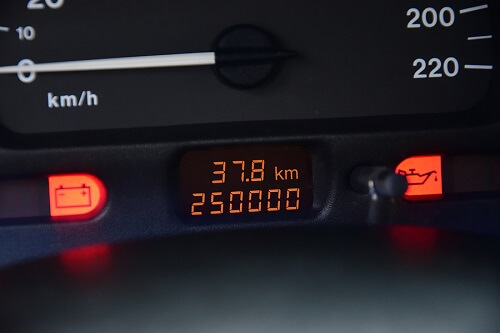 5 Car Maintenance Tips for High Mileage Vehicles | ABS Unlimited in Fairfax, VA. An odometer showing high 200,000 mileage of a car.